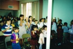 Children Singing in Worship Service